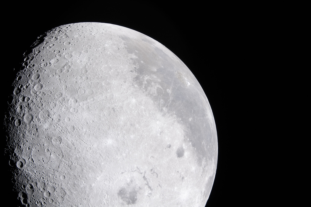 In this image provided by NASA, the Artemis II crew photographed a bright portion of the Moon on April 6, 2026. (NASA via AP)