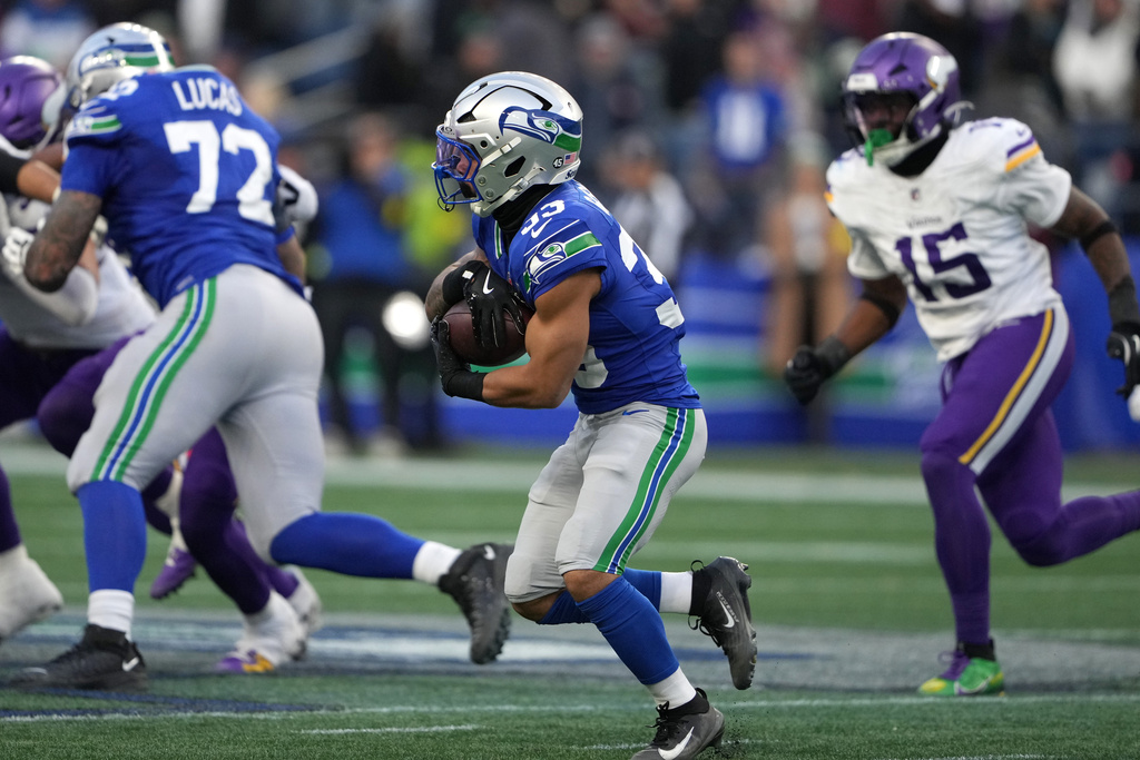 Seattle Seahawks cornerback Tyler Hall (33) runs against the Minnesota Vikings during the second half of an NFL football game Sunday, Nov. 30, 2025, in Seattle. (AP Photo/Lindsey Wasson)
