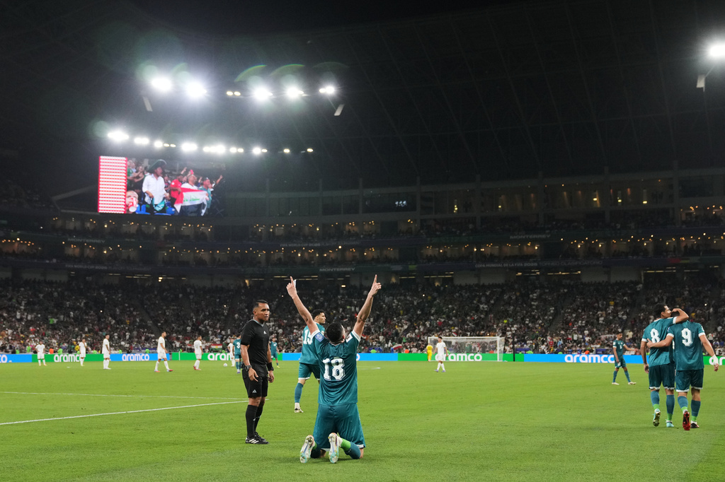 Iraq's Aymen Hussein celebrates scoring his side's 2nd goal during the World Cup playoff final soccer match between Iraq and Bolivia in Monterrey, Mexico, Tuesday, March 31, 2026. (AP Photo/Fernando Llano)