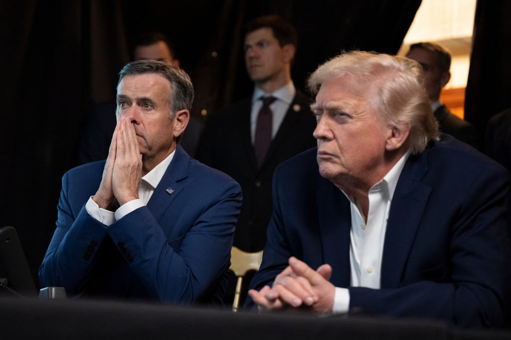 In this photo released by the White House, President Donald Trump monitors U.S. military operations in Venezuela, with CIA Director John Ratcliffe, left, at Mar-a-Lago in Palm Beach, Fla., Saturday, Jan. 3, 2026. (Molly Riley/The White House via AP)