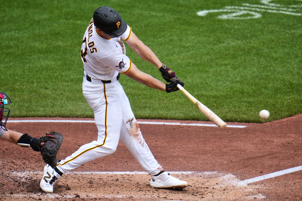 Pittsburgh Pirates' Bryan Reynolds drives in a run with a single off Boston Red Sox pitcher Patrick Sandoval during the third inning of a baseball game in Pittsburgh, Sunday, Aug. 16, 2026. (AP Photo/Gene J. Puskar)
