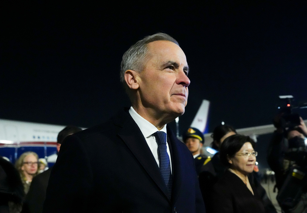 Prime Minister Mark Carney arrives in Beijing, China on Wednesday, Jan. 14, 2026. (Sean Kilpatrick/The Canadian Press via AP)