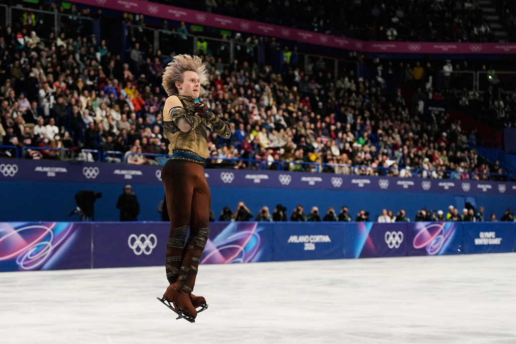 Ilia Malinin of the United States competes during the men's figure skating short program at the 2026 Winter Olympics, in Milan, Italy, Tuesday, Feb. 10, 2026. (AP Photo/Ashley Landis)