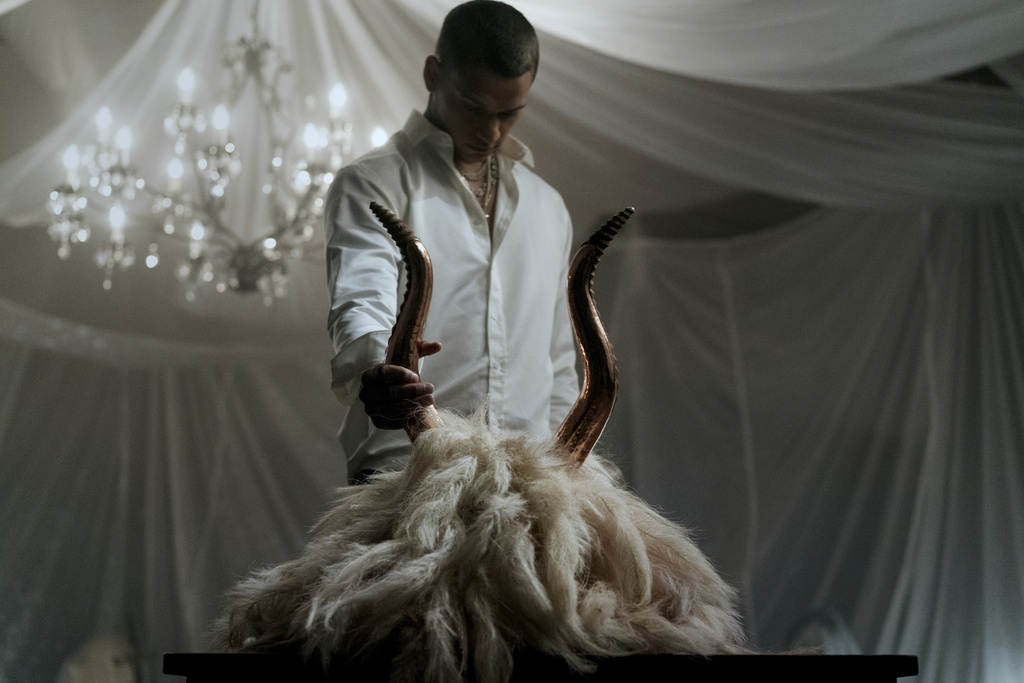 This image released by Universal Pictures shows Tyriq Withers in a scene from "Him." (Universal Pictures via AP)