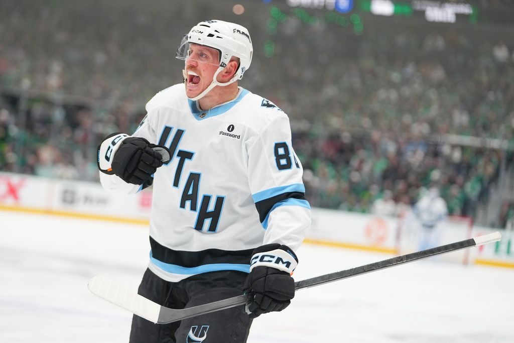 Utah Mammoth defenseman Nate Schmidt celebrates after scoring a second period goal against the Dallas Stars during an NHL hockey game Monday, March 16, 2026, in Dallas. (AP Photo/Julio Cortez)