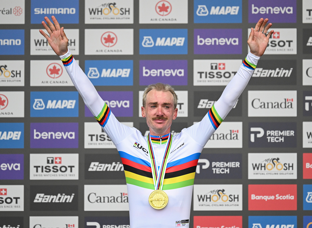 Brandon McNulty, of the United States, celebrates after winning the men's elite road race at the UCI Road World Championships cycling event in Montreal on Sunday, Sept. 27, 2026. (Graham Hughes/The Canadian Press via AP)