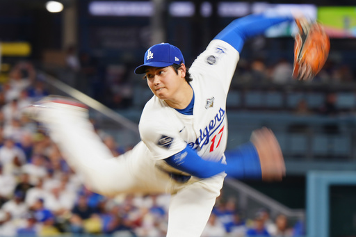 Los Angeles Dodgers pitcher Shohei Ohtani (17) delivers a pitch against the Toronto Blue Jays during fourth inning Game 4 World Series playoff MLB baseball action in Los Angeles on Tuesday, Oct. 28, 2025. (Frank Gunn/The Canadian Press via AP) Los Angeles Dodgers pitcher Shohei Ohtani (17) delivers a pitch against the Toronto Blue Jays during fourth inning Game 4 World Series playoff MLB baseball action in Los Angeles on Tuesday, Oct. 28, 2025. (Frank Gunn/The Canadian Press via AP)