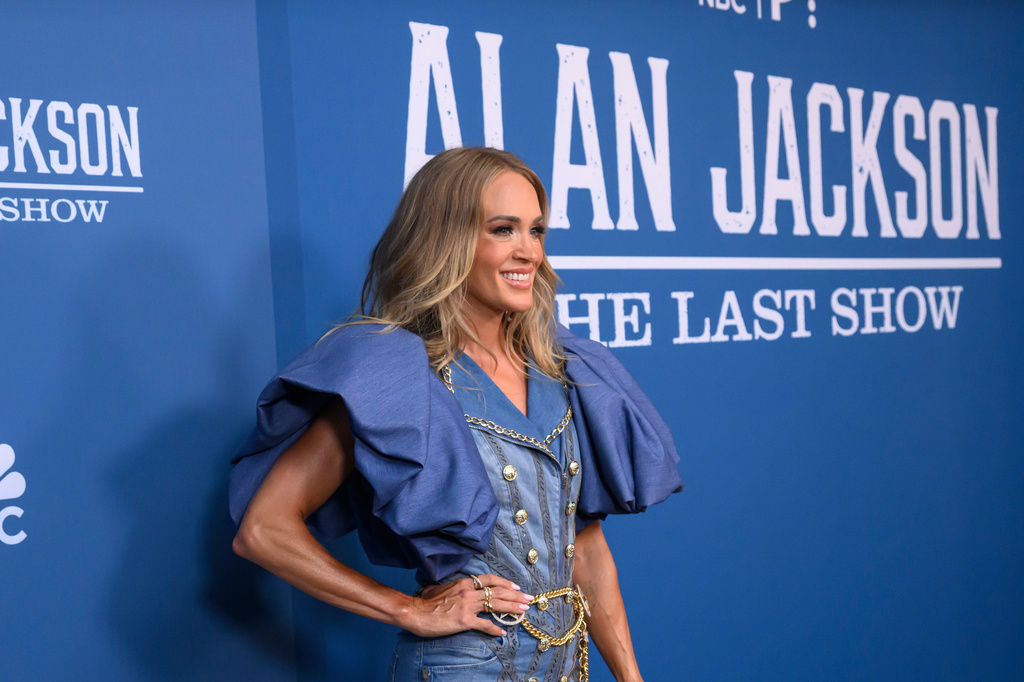 Carrie Underwood arrives on the red carpet for Alan Jackson's final farewell concert called, "Last Call: One More for the Road - The Finale," at Nissan Stadium, Saturday, June 27, 2026, in Nashville, Tenn. (AP Photo/John Amis)