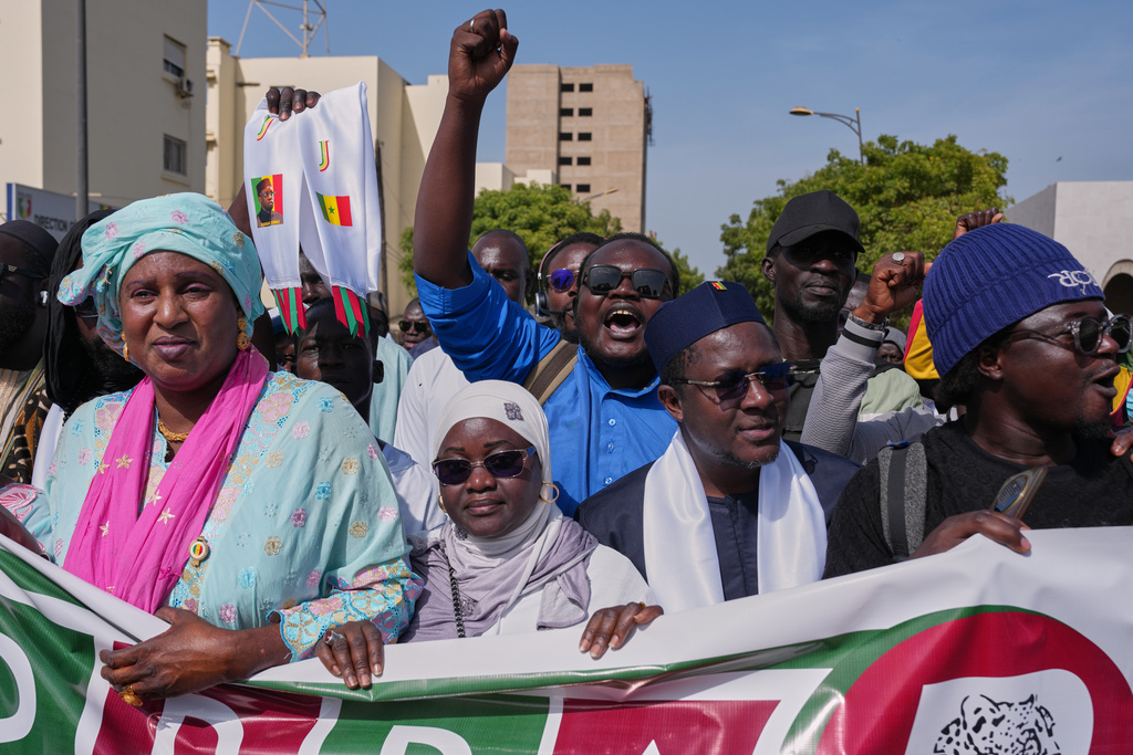 Protesters take to the streets to demonstrate against homosexuality in Dakar, Senegal, Friday, March 6, 2026. (AP Photo/Misper Apawu)