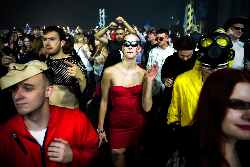 People attend a Halloween rave in Kyiv, Ukraine, Saturday, Oct. 25, 2025. (AP Photo/Julia Demaree Nikhinson)