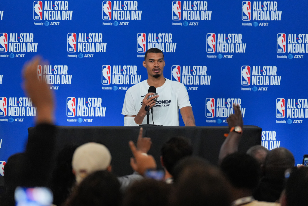 San Antonio Spurs' Victor Wembanyama talks to reporters during the NBA All-Star basketball game media day Saturday, Feb. 14, 2026, in Inglewood, Calif. (AP Photo/Jae C. Hong)