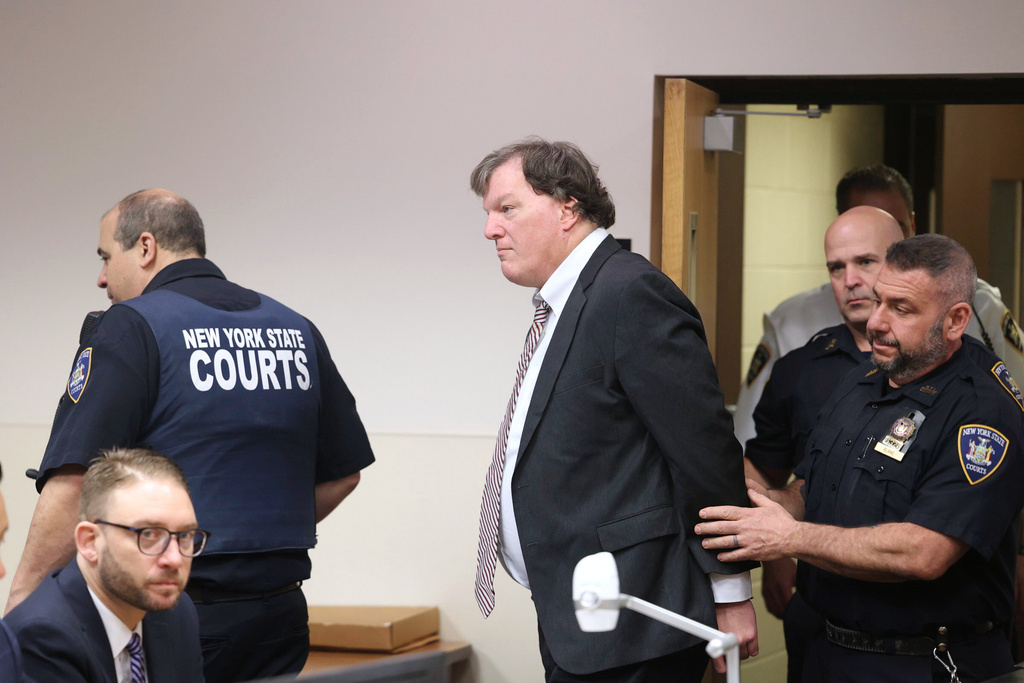 FILE - Alleged Gilgo serial killer Rex Heuermann is led into courtroom for a Frye hearing at Suffolk County Court in Riverhead, N.Y., April 3, 2025. (James Carbone/Newsday via AP, File)