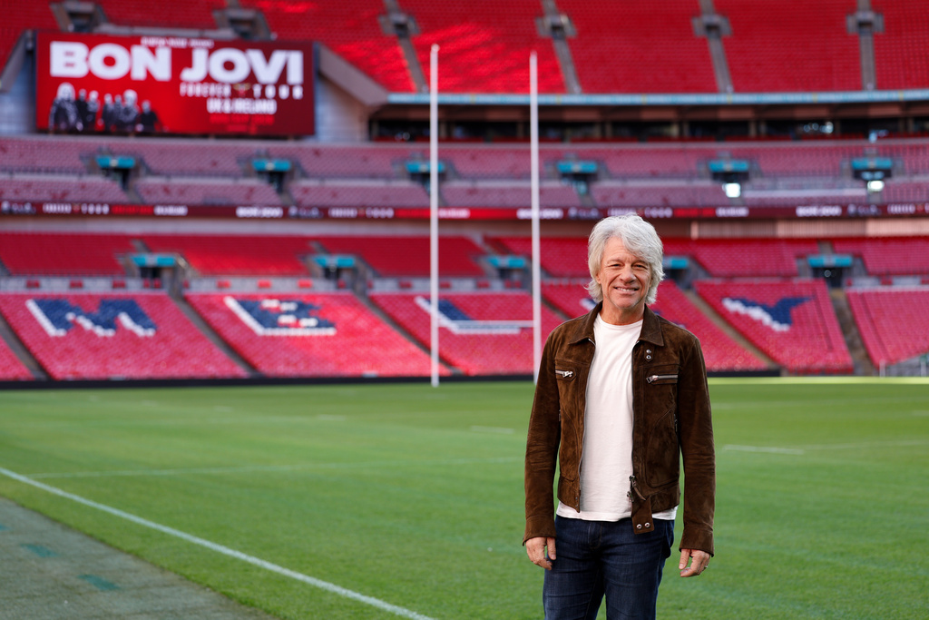 Jon Bon Jovi poses for photographers after announcing an upcoming tour and reimagined album 'Forever: Legendary Edition' during a press conference at Wembley Stadium on Friday, Oct. 24, 2025, in London. (Photo by Millie Turner/Invision/AP)