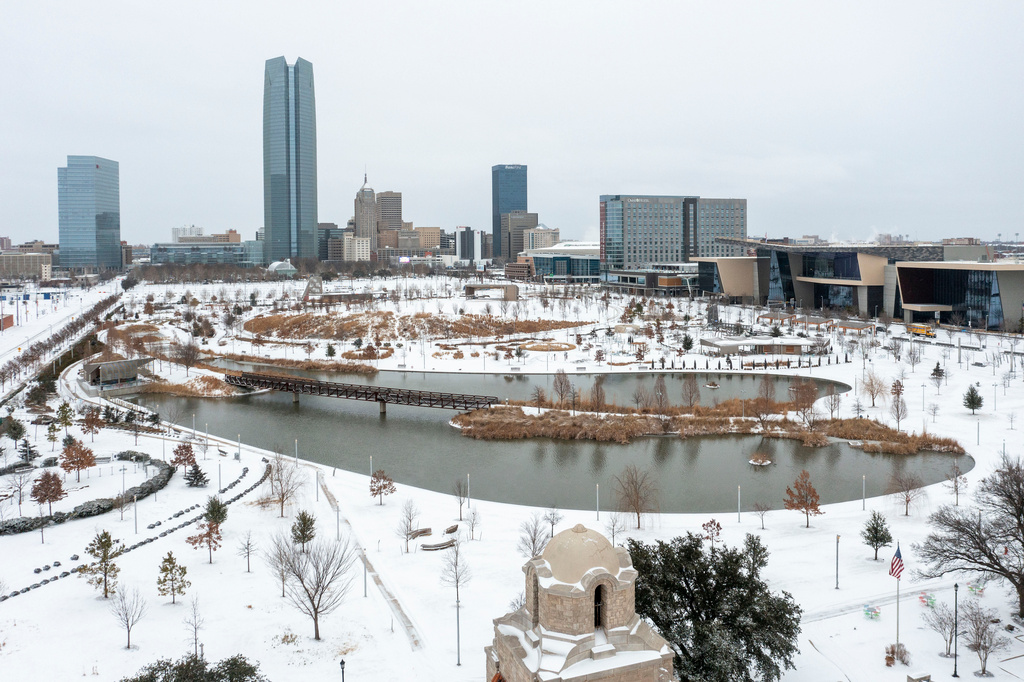 An aerial view of snowfall in downtown Oklahoma City on Saturday, Jan. 24, 2026. (AP Photo/Alonzo Adams)