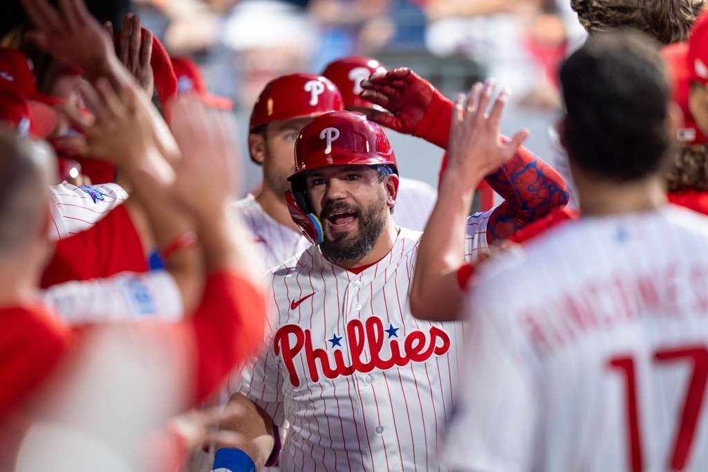 Philadelphia Phillies' Kyle Schwarber, center, celebrates his three-run home run and his second of the inning with teammates during the third inning of a baseball game against the New York Mets, Saturday, June 20, 2026, in Philadelphia. (AP Photo/Chris Szagola)