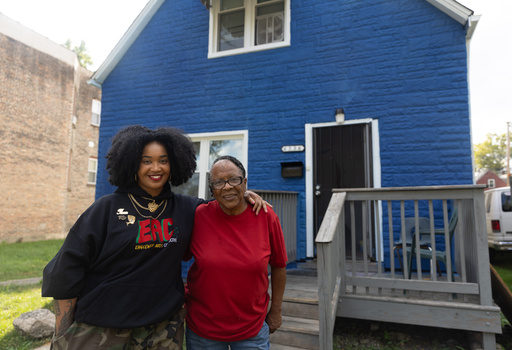 Artist Tonika Lewis Johnson and local resident Justine Stephens, right, stand for portrait in the 6500-block of South Aberdeen Street in Chicago's Englewood neighborhood, on Monday, Oct. 6, 2025. (AP Photo/Talia Sprague) Artist Tonika Lewis Johnson and local resident Justine Stephens, right, stand for portrait in the 6500-block of South Aberdeen Street in Chicago's Englewood neighborhood, on Monday, Oct. 6, 2025. (AP Photo/Talia Sprague)