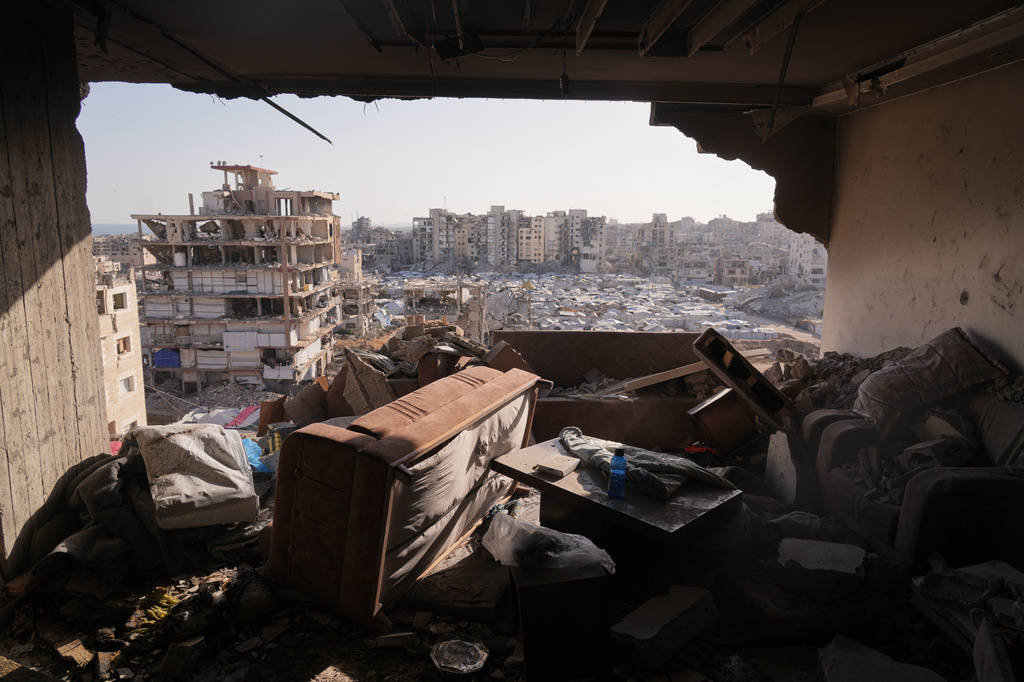A damaged apartment in a residential building is seen after an overnight Israeli strike in Gaza City, Thursday, June 4, 2026. (AP Photo/Jehad Alshrafi)