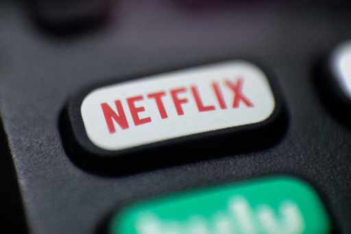 FILE - This Aug. 13, 2020 photo shows a logo for Netflix on a remote control in Portland, Ore. (AP Photo/Jenny Kane, File) FILE - This Aug. 13, 2020 photo shows a logo for Netflix on a remote control in Portland, Ore. (AP Photo/Jenny Kane, File)