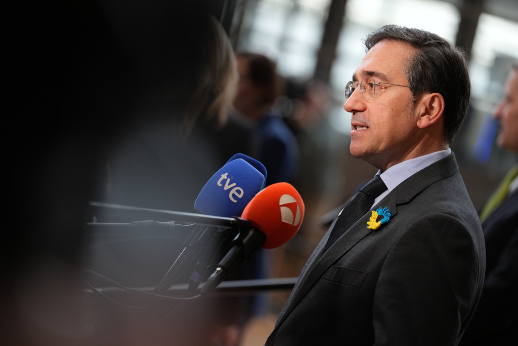 Spain's Foreign Minister Jose Manuel Albares Bueno speaks with the media as he arrives for a meeting of EU foreign ministers at the European Council building in Brussels, Monday, Feb. 23, 2026. (AP Photo/Virginia Mayo)