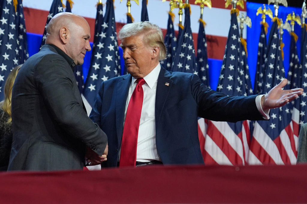 FILE - Republican presidential nominee former President Donald Trump talks with UFC CEO Dana White at an election night watch party at the Palm Beach Convention Center, Nov. 6, 2024, in West Palm Beach, Fla. (AP Photo/Evan Vucci, File)