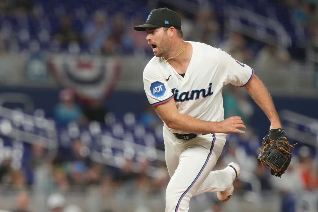 Miami Marlins pitcher Anthony Bender throws a pitch in the seventh inning during a baseball game against the Chicago White Sox Tuesday, March 31, 2026, in Miami. (AP Photo/Marta Lavandier)