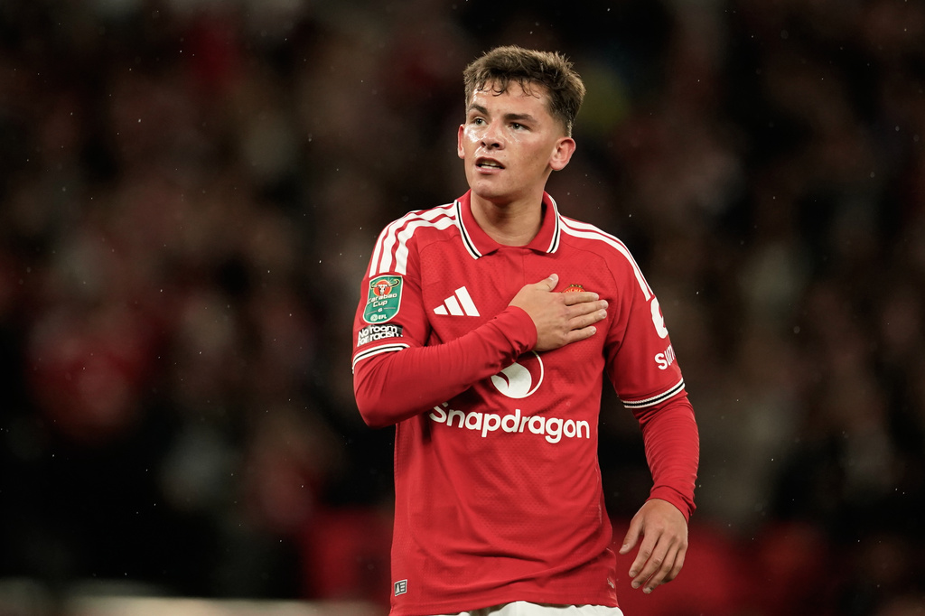 Manchester United's Shea Lacey celebrates after scoring the opening goal during the English League Cup third round soccer match between Manchester United and Brighton and Hove Albion in Manchester, England, Wednesday, Sept. 16, 2026. (AP Photo/Dave Thompson)