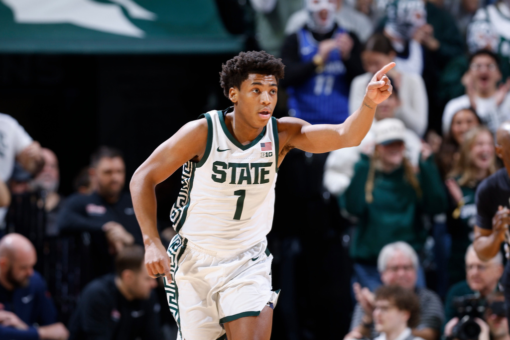 Michigan State guard Jeremy Fears Jr. (1) reacts after hitting a basket during the first half of an NCAA college basketball game against Illinois, Saturday, Feb. 7, 2026, in East Lansing, Mich. (AP Photo/Al Goldis)