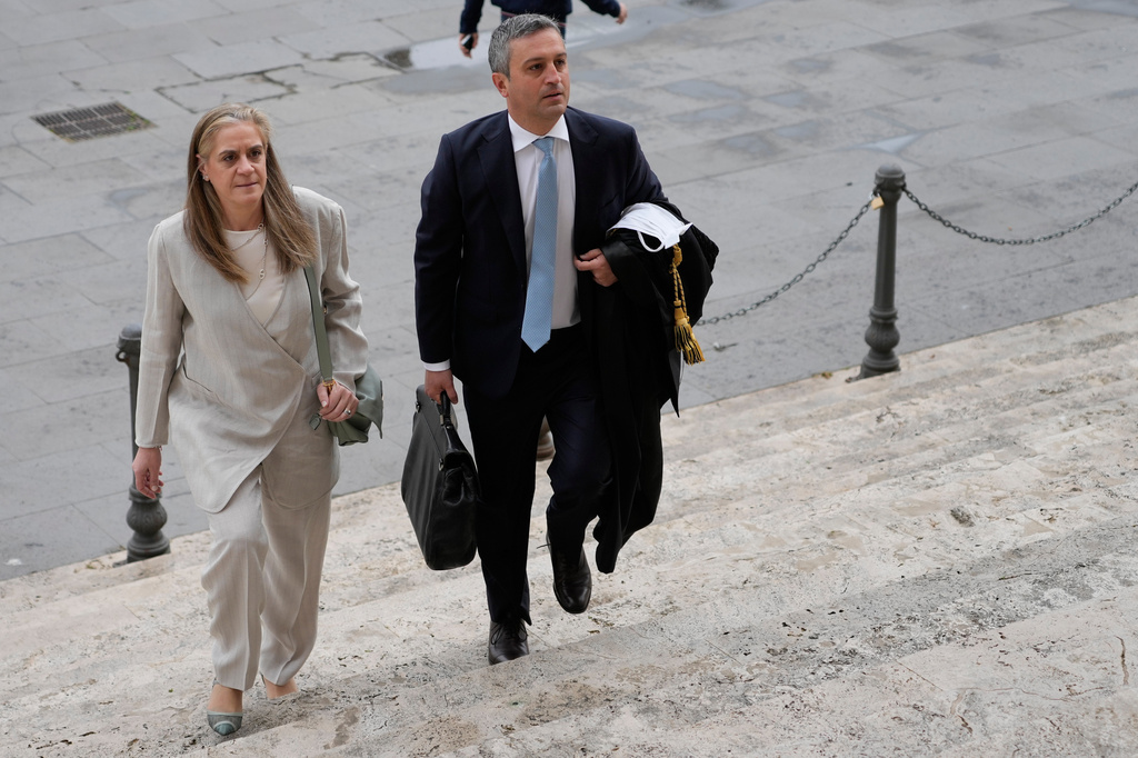 Italian lawyers Marco Mellone, right, and Graziella Cerulli arrive at Italy's highest Court of Cassation, in Rome, Tuesday, April 14, 2026, to argue against the new citizenship law that restricts citizenship by descent. (AP Photo/Gregorio Borgia)