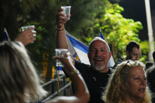 Relatives and supporters of Israeli hostages held by Hamas in the Gaza Strip celebrate after the announcement that Israel and Hamas have agreed to the first phase of a peace plan, as they gather at a plaza known as the hostages square in Tel Aviv, Israel, Thursday, Oct. 9, 2025. (AP Photo/Emilio Morenatti) Relatives and supporters of Israeli hostages held by Hamas in the Gaza Strip celebrate after the announcement that Israel and Hamas have agreed to the first phase of a peace plan, as they gather at a plaza known as the hostages square in Tel Aviv, Israel, Thursday, Oct. 9, 2025. (AP Photo/Emilio Morenatti)