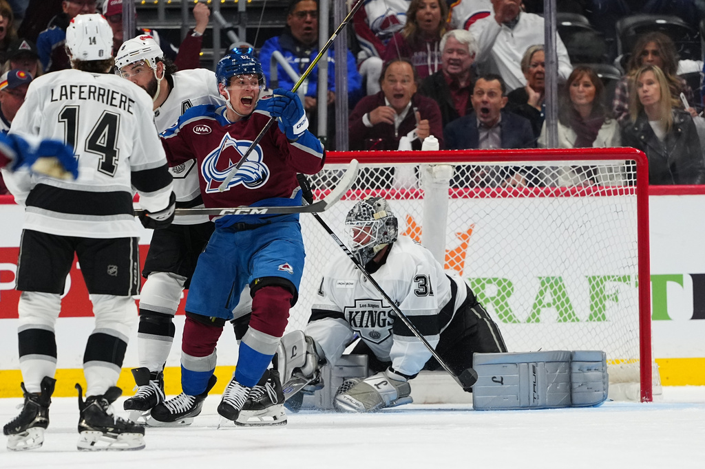 Colorado Avalanche left wing Artturi Lehkonen (62) celebrates after a goal against Los Angeles Kings goaltender Anton Forsberg (31) during the second period of Game 1 in the first round of the NHL hockey Stanley Cup playoffs, Sunday, April 19, 2026, in Denver. (AP Photo Jack Dempsey)