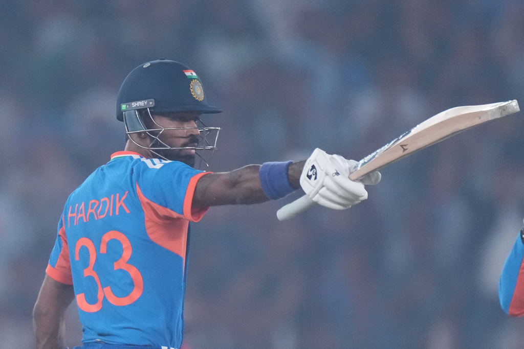 India's Hardik Pandya celebrates after scoring fifty runs during the fifth T20 cricket match between India and South Africa in Ahmedabad, India, Friday, Dec. 19, 2025. (AP Photo/Ajit Solanki)