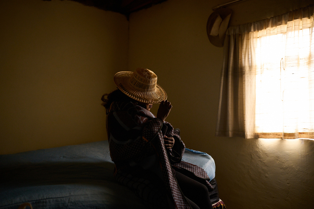 A 32-year-old HIV-positive sex worker who spoke to AP on condition of anonymity over fears of stigma poses for a portrait in Maputsoe, Lesotho, Thursday, July 17, 2025. She worked for a USAID-funded organization that provided medical services to people most vulnerable to HIV and AIDS. Losing her job and her salary means she is now solely dependent on sex work to provide for her 9-year-old daughter. (AP Photo/Bram Janssen)