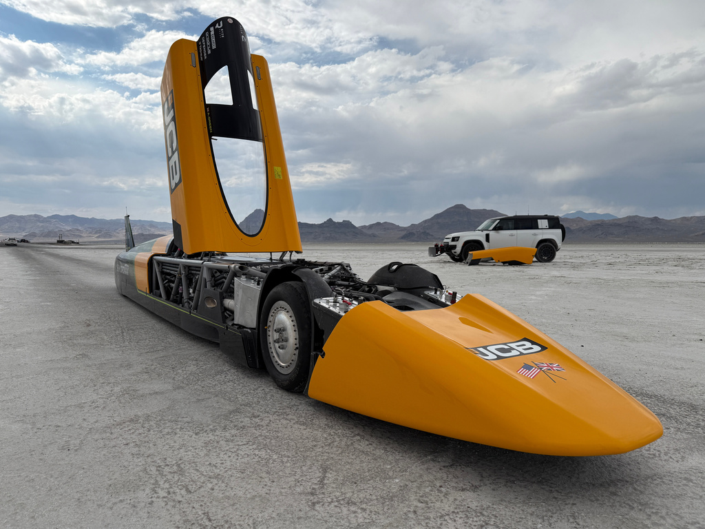 The JCB Hydromax sits on the Bonneville Salt Flats in Wendover, Utah, where Andy Green aims to drive it to a land speed record for cars powered by hydrogen internal combustion engines, Monday, Aug. 10, 2026. (AP Photo/Hannah Schoenbaum)