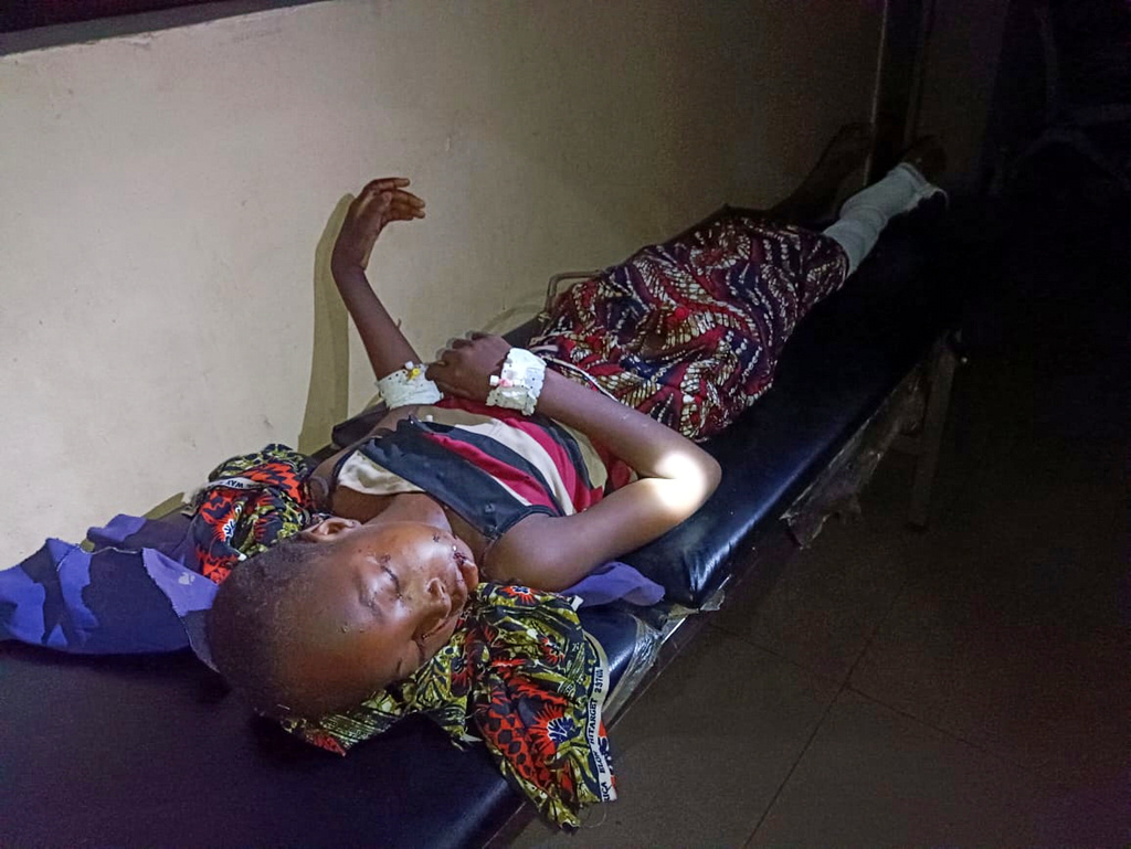 In this photo released by Amnesty International Nigeria, a patient receives treatment at the Yariman Bakura Specialist hospital in Gusau, Nigeria, Monday, May 11, 2026, after a Nigerian military airstrike struck a market on Sunday. (Amnesty International Nigeria Via AP)