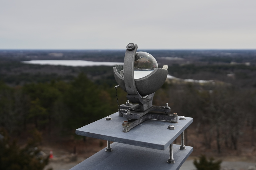 A Campbell-Stokes sunshine recorder operates at the Blue Hill Observatory and Science Center, Friday, March 13, 2026, in Milton, Mass. (Laura Martin Agudelo/MIT Graduate Program in Science Writing via AP)