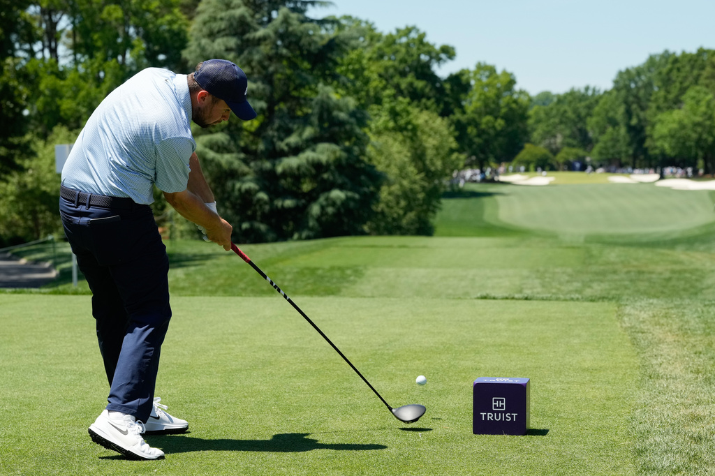 Alex Fitzpatrick, of England, hits off the third tee during the final round of the Truist Championship golf tournament at the Quail Hollow Club, Sunday, May 10, 2026, in Charlotte, N.C. (AP Photo/Chris Carlson)