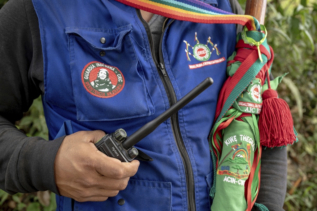 Eduwin Calambas Fernandez, coordinator of Kiwe Thegnas, which refers to Indigenous Guard in the Nasa Yuwe language, in Canoas, an Indigenous reserve in northern Cauca, Colombia, poses for a photo on July 15, 2025. (AP Photo/Nadège Mazars)