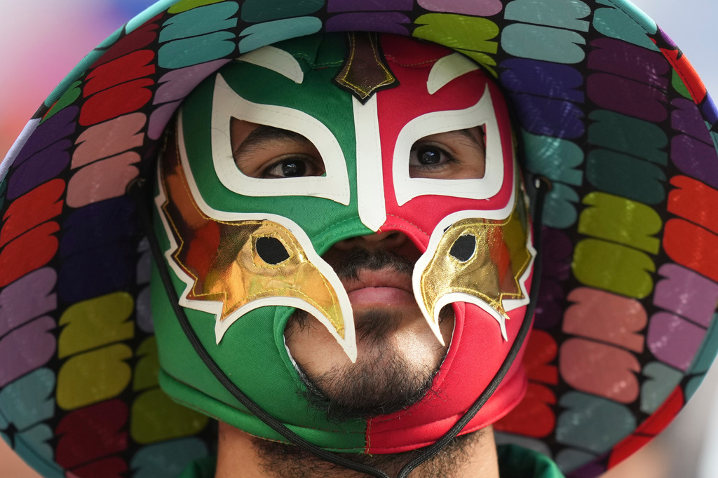 A fan reacts ahead of the World Cup Group G soccer match between Iran and New Zealand in Inglewood, Calif., near Los Angeles, Monday, June 15, 2026. (AP Photo/Andre Penner)