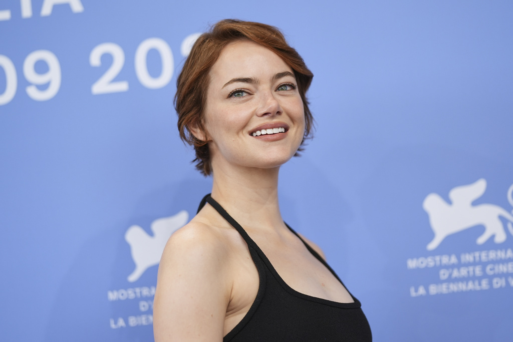 Emma Stone poses for photographers at the photo call for the film 'Bugonia' during the 82nd edition of the Venice Film Festival in Venice, Italy, on Thursday, Aug. 28, 2025. (Photo by Scott A Garfitt/Invision/AP)