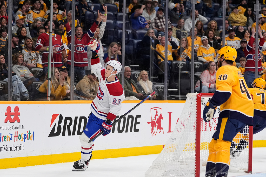 Montreal Canadiens right wing Ivan Demidov (93) celebrates his goal during the first period of an NHL hockey game against the Nashville Predators, Saturday, March 28, 2026, in Nashville, Tenn. (AP Photo/George Walker IV)