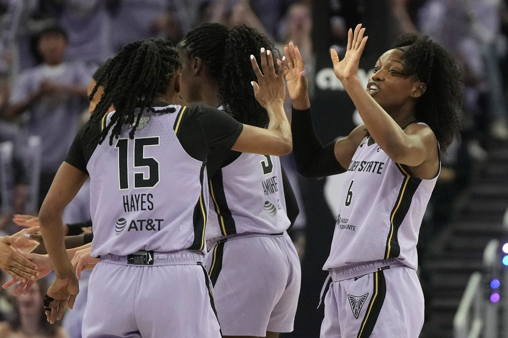 Golden State Valkyries guard Tiffany Hayes (15) celebrates with guard-forward Kaila Charles (6) during the second half of Game 1 of the WNBA basketball finals, Saturday, Oct. 17, 2026, in San Francisco. (AP Photo/Jeff Chiu)