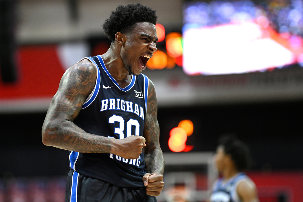 BYU guard Kennard Davis Jr. reacts after a basket during the second half of an NCAA college basketball game against Miami, Thursday, Nov. 27, 2025, in Kissimmee, Fla. (AP Photo/Phelan M. Ebenhack)