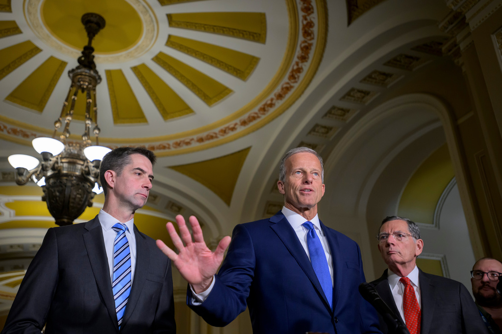 Senate Majority Leader John Thune, R-S.D., center, is joined by Sen. Tom Cotton, R-Ark., left, and Sen. John Barrasso, R-Wyo., right, during the Senate Republican policy luncheon news conference at the Capitol, Tuesday, May 19, 2026, in Washington. (AP Photo/Rod Lamkey, Jr.)