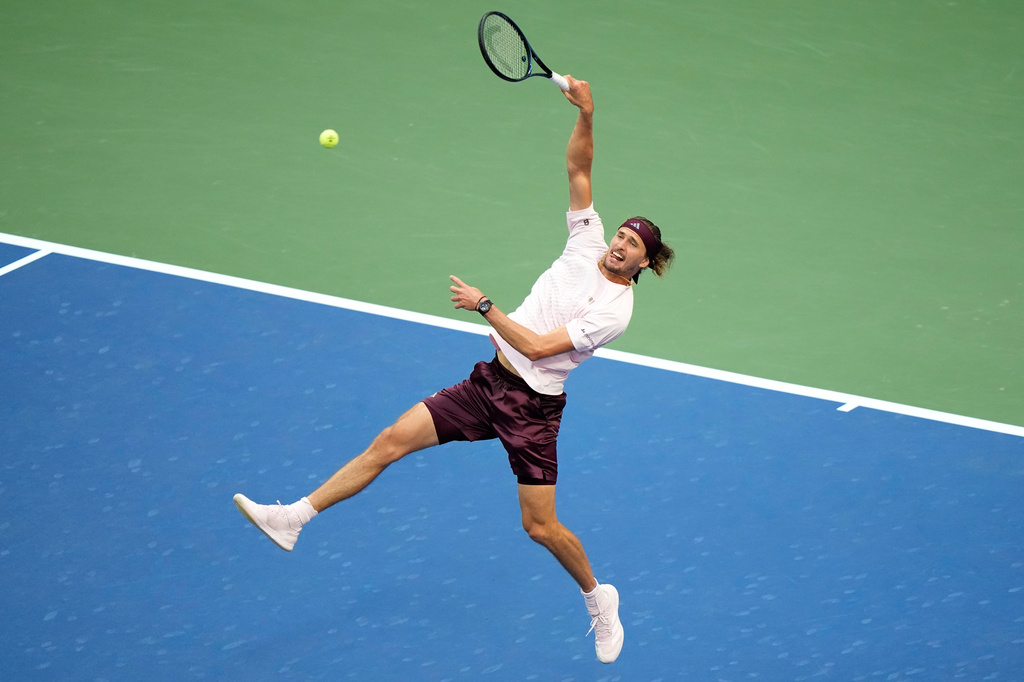 Alexander Zverev, of Germany, returns the ball to Karen Khachanov, of Russia, during the men's singles semifinals of the U.S. Open tennis championships Friday, Sept. 11, 2026, in New York. (AP Photo/Frank Franklin II)