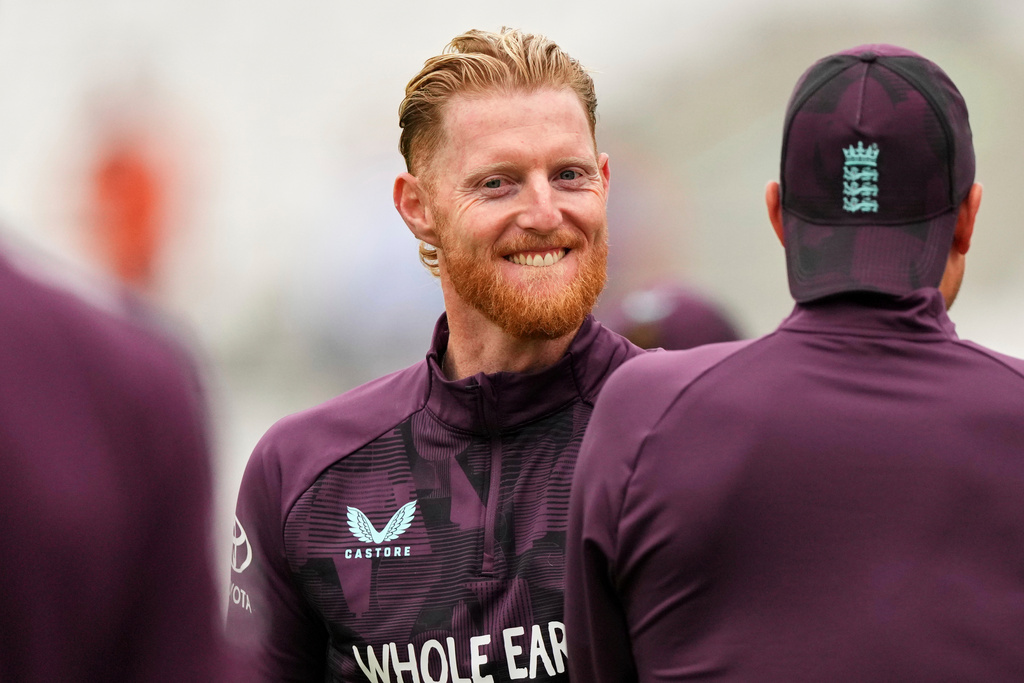 FILE - England's Ben Stokes smiles during warm up on day one of the fifth cricket test match between England and India at The Kia Oval in London on July 31, 2025. (AP Photo/Kirsty Wigglesworth, File)