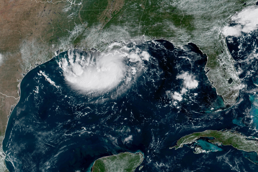 This satellite image released by NOAA shows Potential Tropical Cyclone Five forming over the Gulf of Mexico on Monday, Aug. 31, 2026. (NOAA via AP)