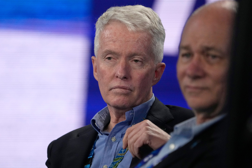 FILE - Australian Open tournament director Craig Tiley watches the fourth round match between Stefanos Tsitsipas of Greece and Jannik Sinner of Italy at the Australian Open tennis championship in Melbourne, Australia, Jan. 22, 2023. (AP Photo/Mark Baker, file)