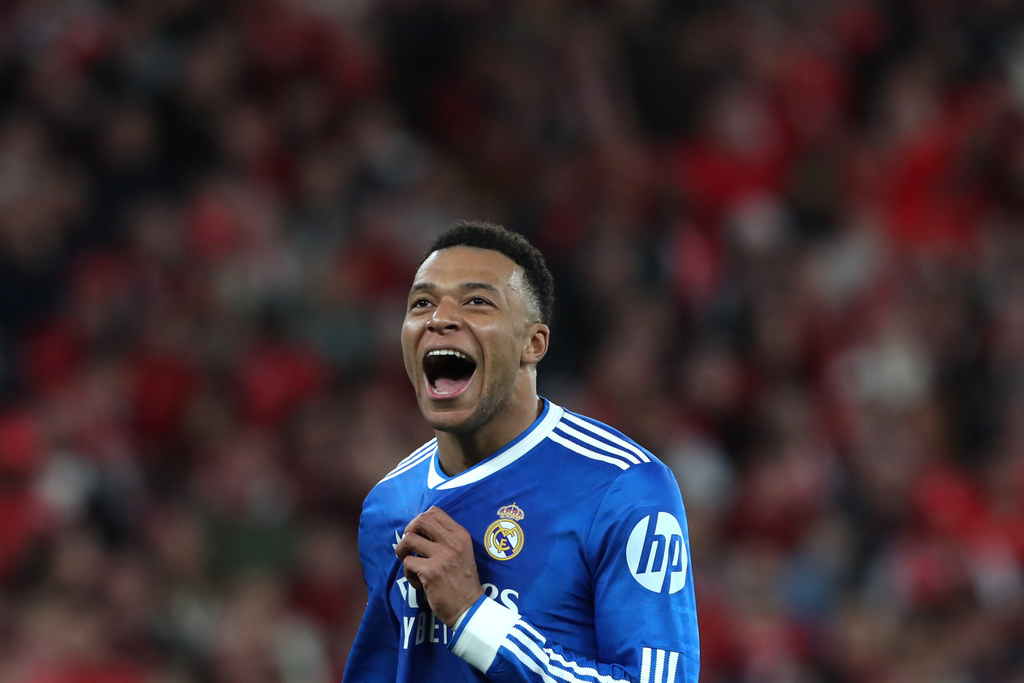 Real Madrid's Kylian Mbappe reacts during a Champions League playoff soccer match soccer match between SL Benfica and Real Madrid in Lisbon, Portugal, Tuesday, Feb. 17, 2026. (AP Photo/Pedro Rocha)