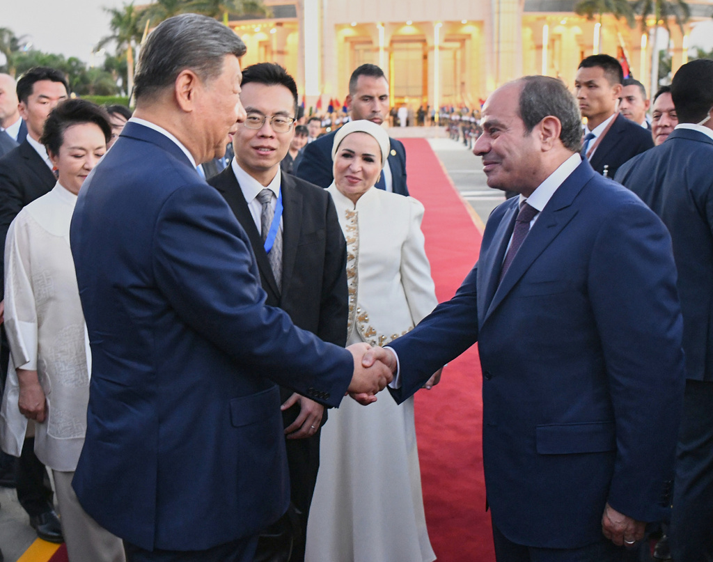 In this photo provided by the Egyptian presidential press office, Egyptian President Abdel-Fattah el-Sissi, right, greets Chinese President Xi Jinping before a tour of the Grand Egyptian Museum in Giza, Egypt, Wednesday, Sept. 2, 2026. (Egyptian Presidential Press Office via AP)