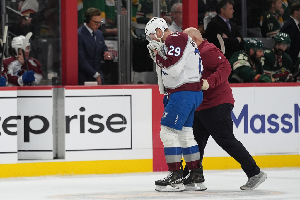 Colorado Avalanche center Nathan MacKinnon (29) leaves the ice during the second period of Game 4 in an NHL Stanley Cup hockey second-round playoff series against the Minnesota Wild Monday, May 11, 2026, in St. Paul, Minn. (AP Photo/Abbie Parr)
